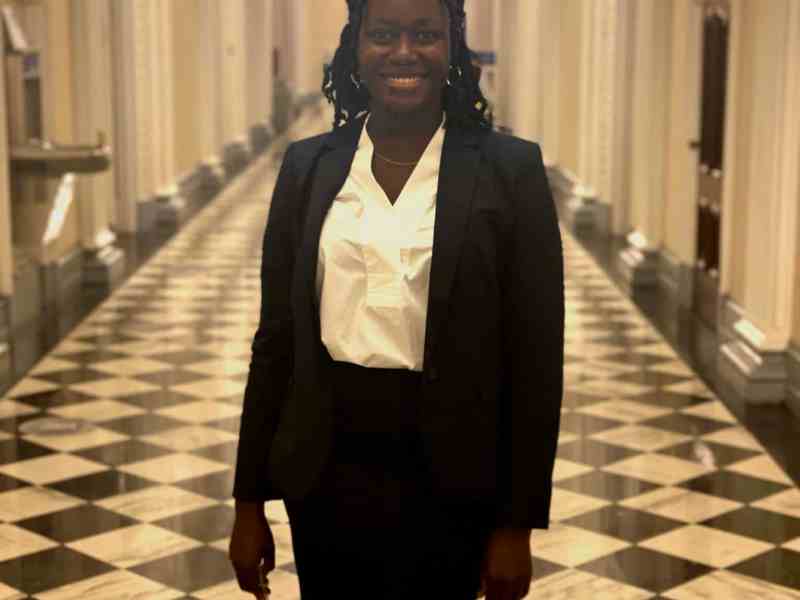 Astou Thiane is as an assistant principal. She advocates for a path to citzenship.
