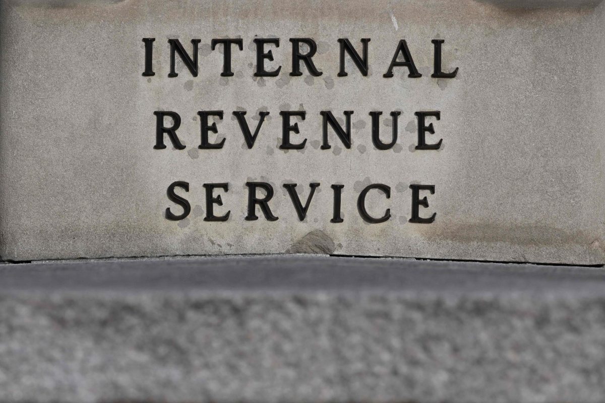An up-close photo of the Internal Revenue Service sign on the headquarters.